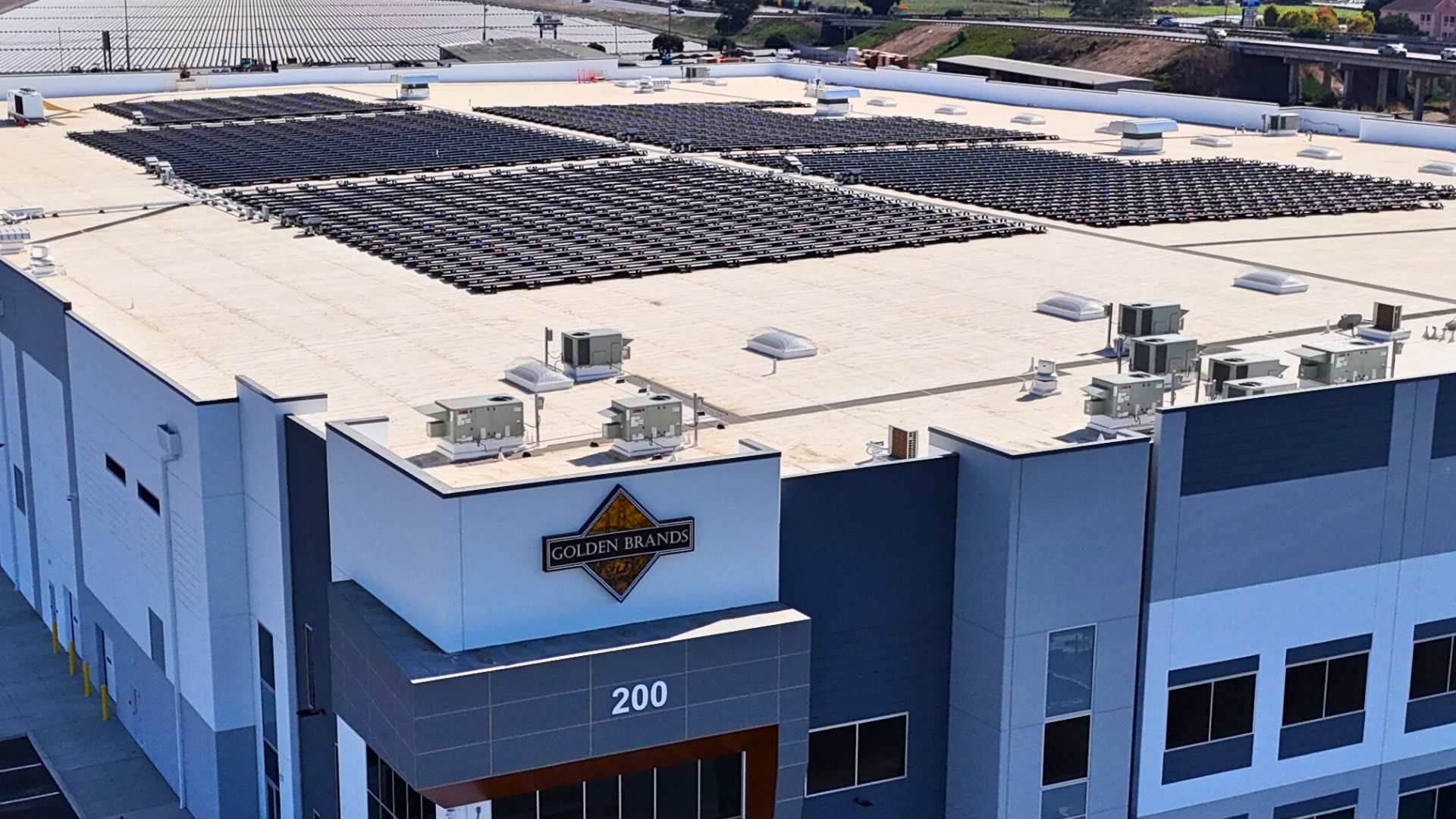 aerial shot of solar panels on top of building