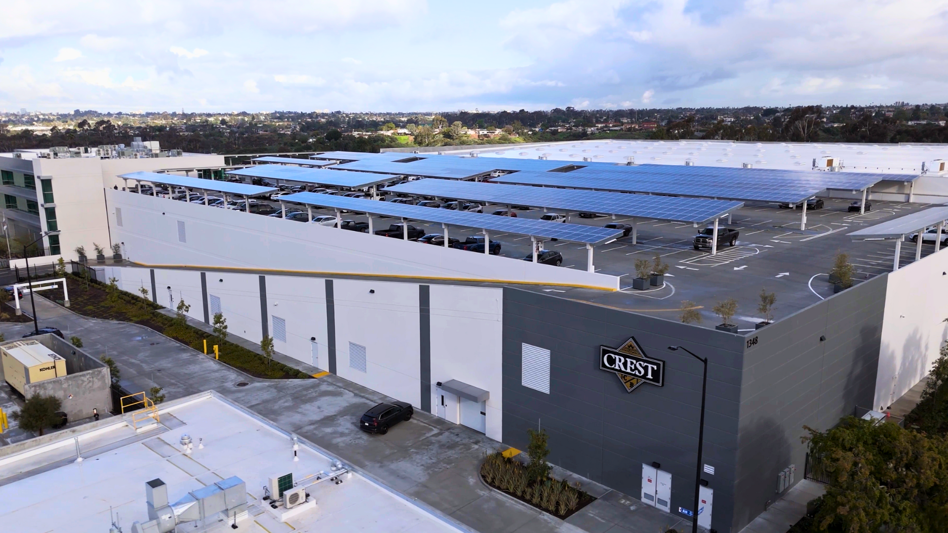 aerial shot of solar panels on top of building